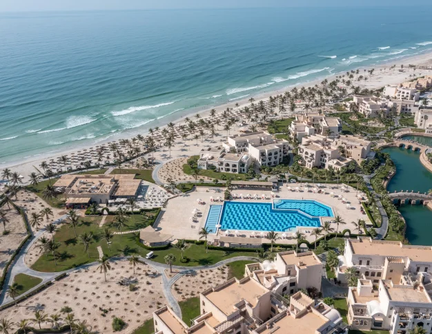 Aerial view for the Pool and beach at Rotana Salalah Hotel