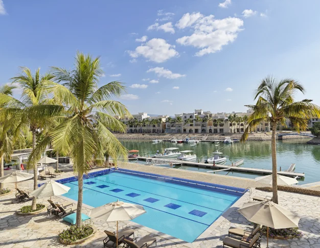 Juweira Boutique Hotel Pool, with a Marina view, Hawana Salalah.