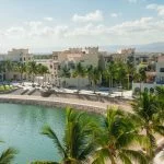 Photo for building and lagoon with palm trees at Hawana Salalah Oman