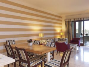 Juweira-Boutique-Hotel-Hawana-Salalah-Oman-Two-Bedroom-Apartment-Red-Dining-&-Livingroom