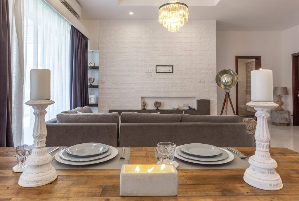 Hawana Lagoons, image from inside house for a candle romantic setting and a sofa at Hawana Salalah Oman