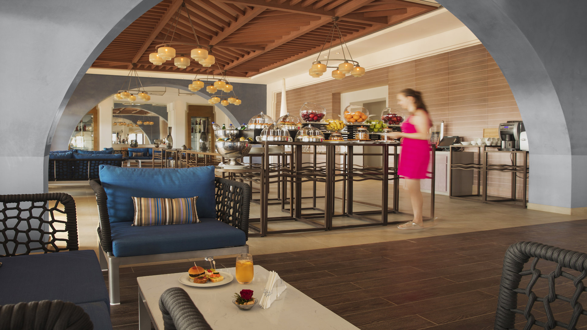 Afternoon snacks buffet with mini croissant and fruits at Rotana Salalah Oman.