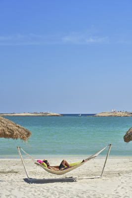 Man is relaxing on Juweira's beach