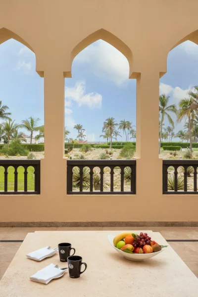 Two Bedroom suite Terrace with a garden and sea view at Rotana Salalah Resort