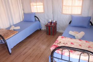 empty quarter eco lodge bungalow Salalah twin beds (1)