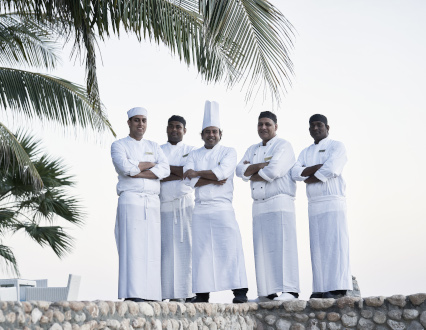 group of chefs at the club house restaurant in fanar hotel