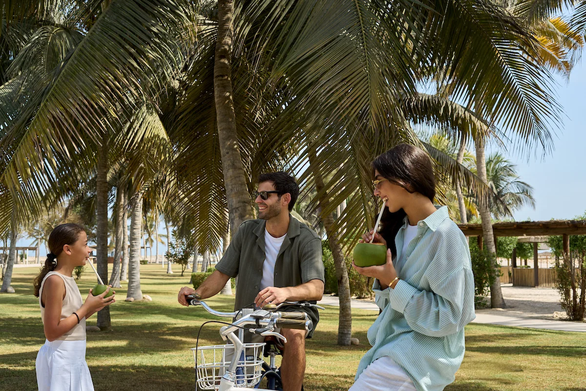 Family enjoying outdoor activities at Hawana Salalah during Khareef