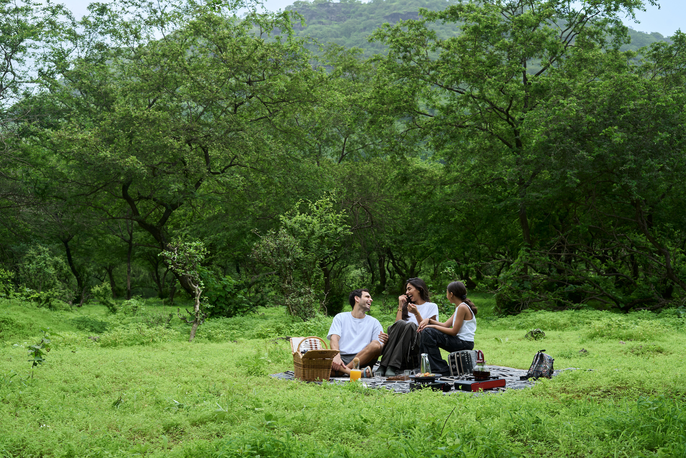 Family enjoying outdoor activities at Hawana Salalah during Khareef