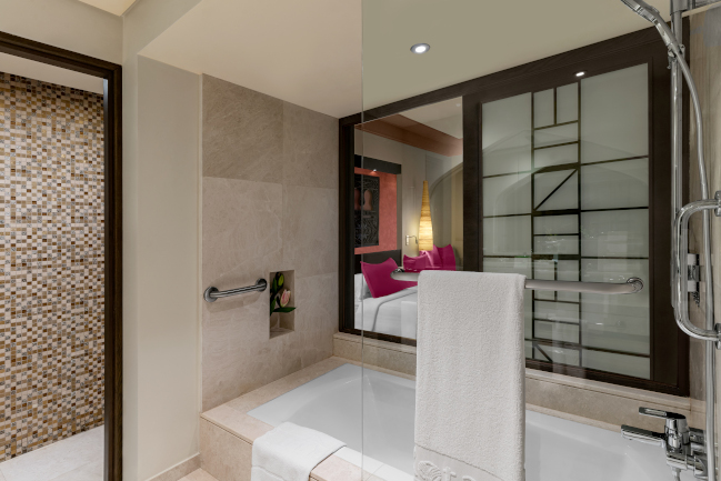 Spacious family garden room bathroom with a shower room at Rotana Salalah Oman