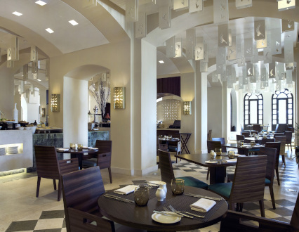 dining area inside saffron restaurant at salalah Rotana resort in Hawana Salalah