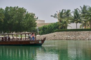 couple on a boat in the lagoon of Hawana Salalah Oman